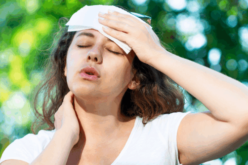 Person showing signs of dehydration and considering urgent care at Solar Urgent Care.